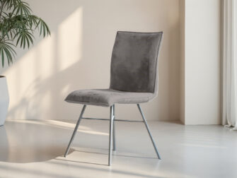 Grijze eetkamerstoel zonder armleuningen met zacht suède en stabiel frame
