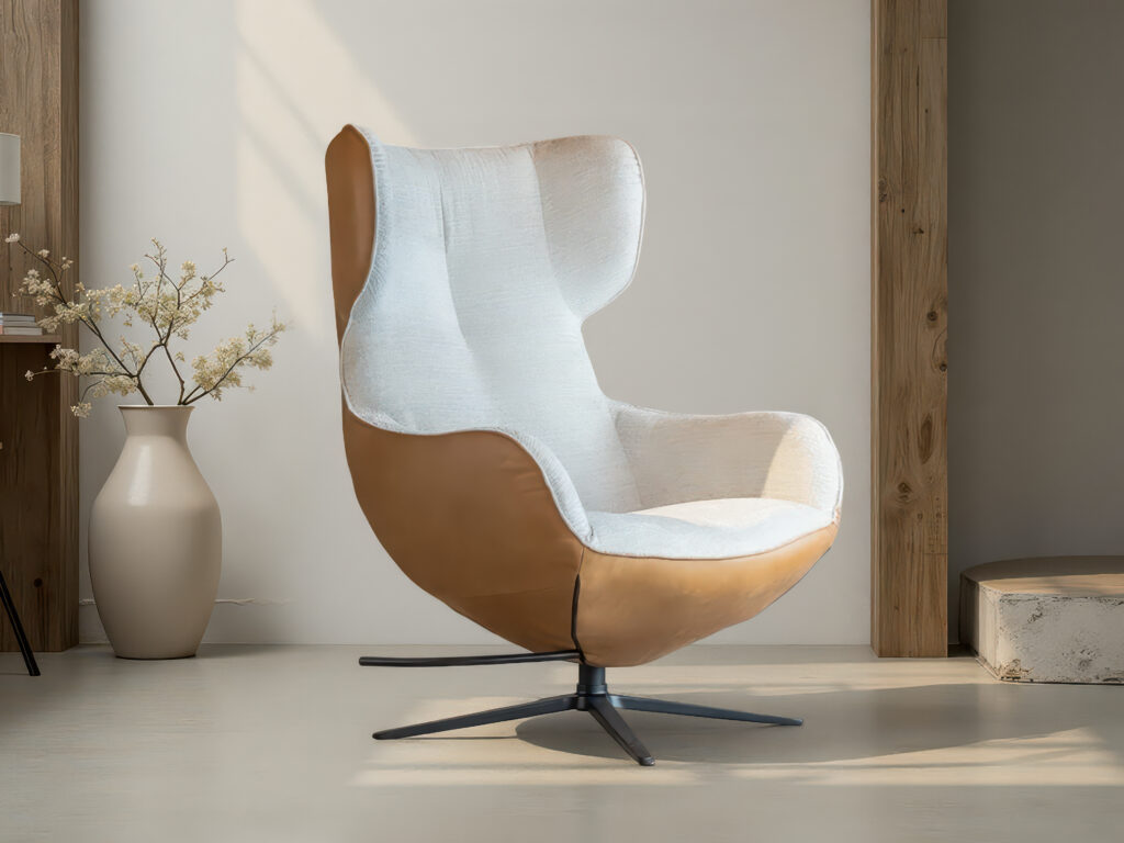 Witte designfauteuil met hoge rugleuning en strakke afwerking