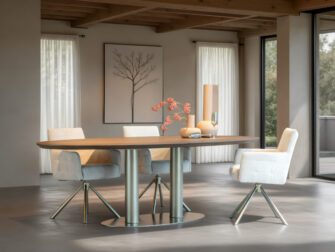 Design eettafel met ovaal blad en dubbele ronde zuilen als onderstel
