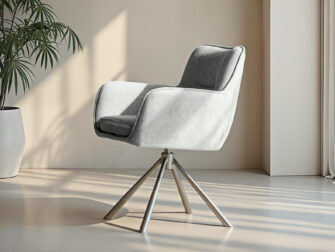 Zachtgrijze eetkamerstoel met gebogen rug en stijlvolle poten