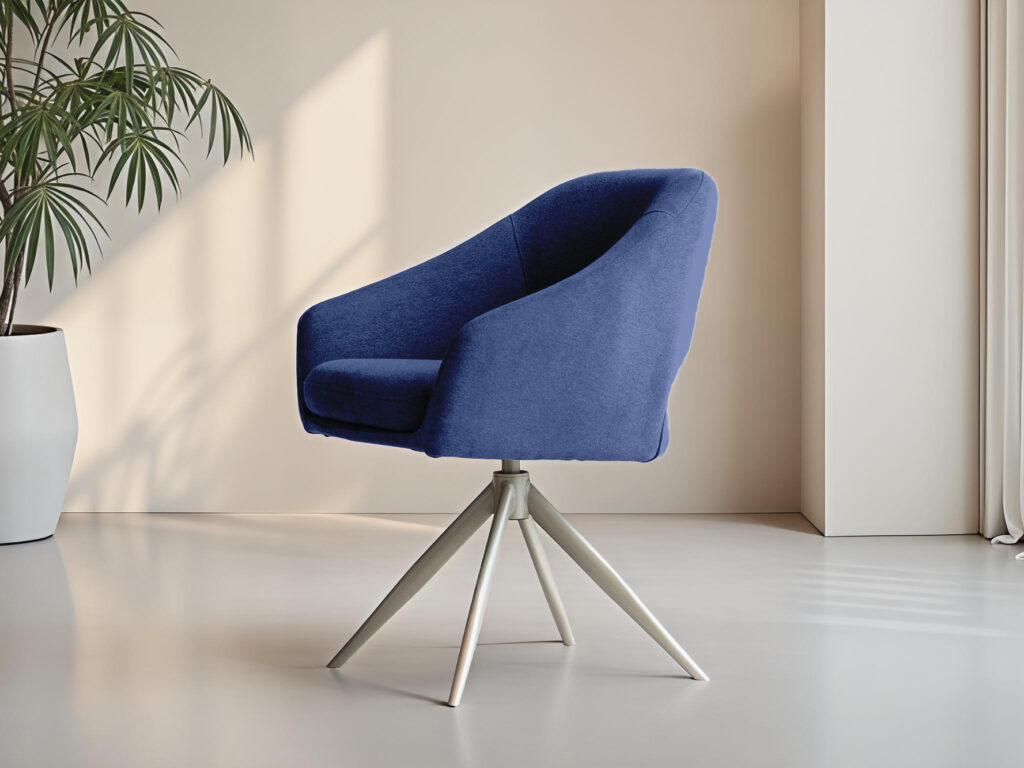 Diepblauwe eetkamerstoel op metalen draaipoot, met zachte bekleding en een elegante kuipvorm