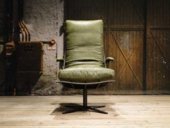 inudstriele groene fauteuil