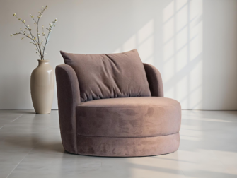 Comfortabele ronde fauteuil in stof met hoge rug en losse kussens