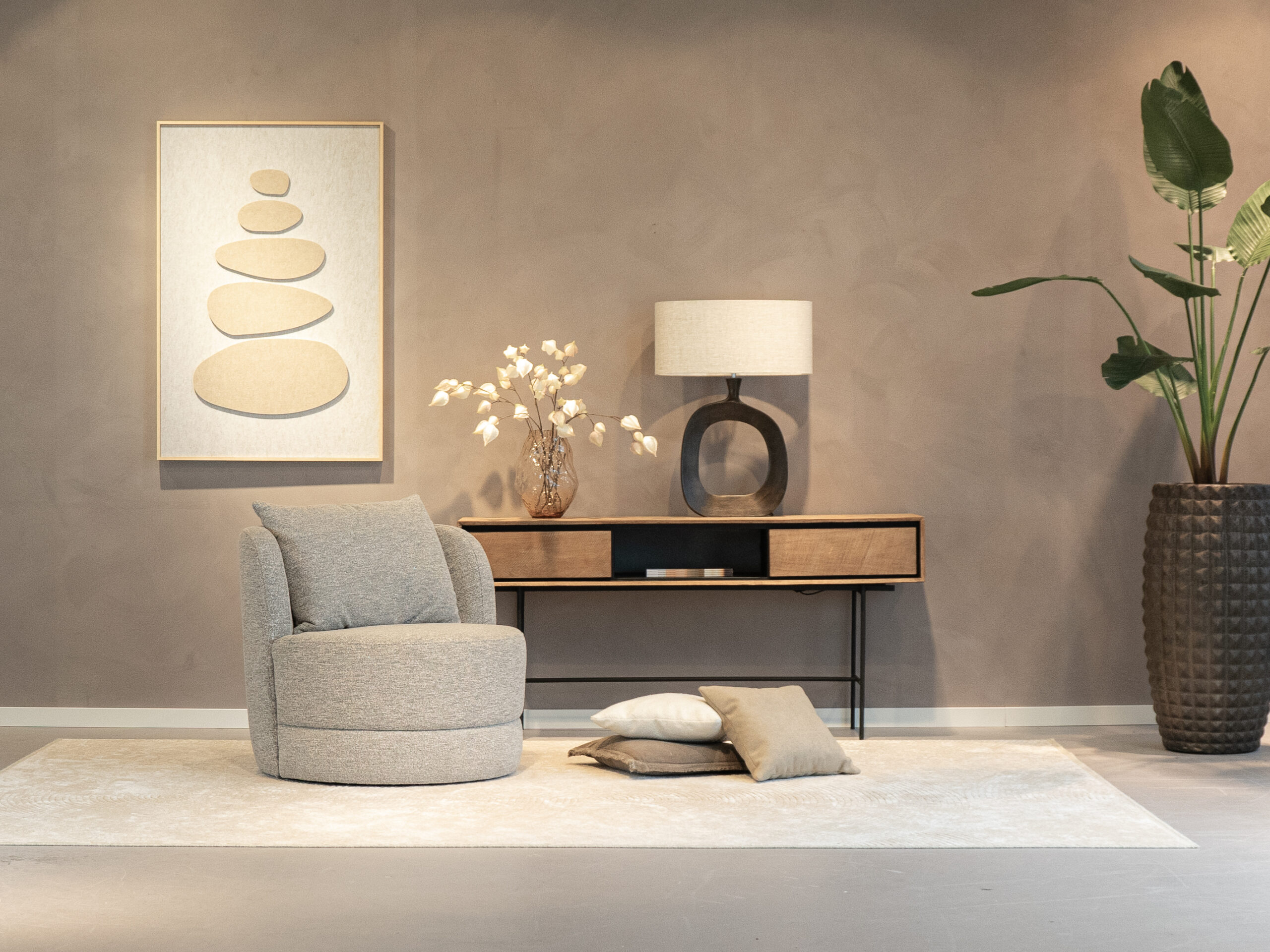 ronde stoffen fauteuil met draaifunctie in grijs