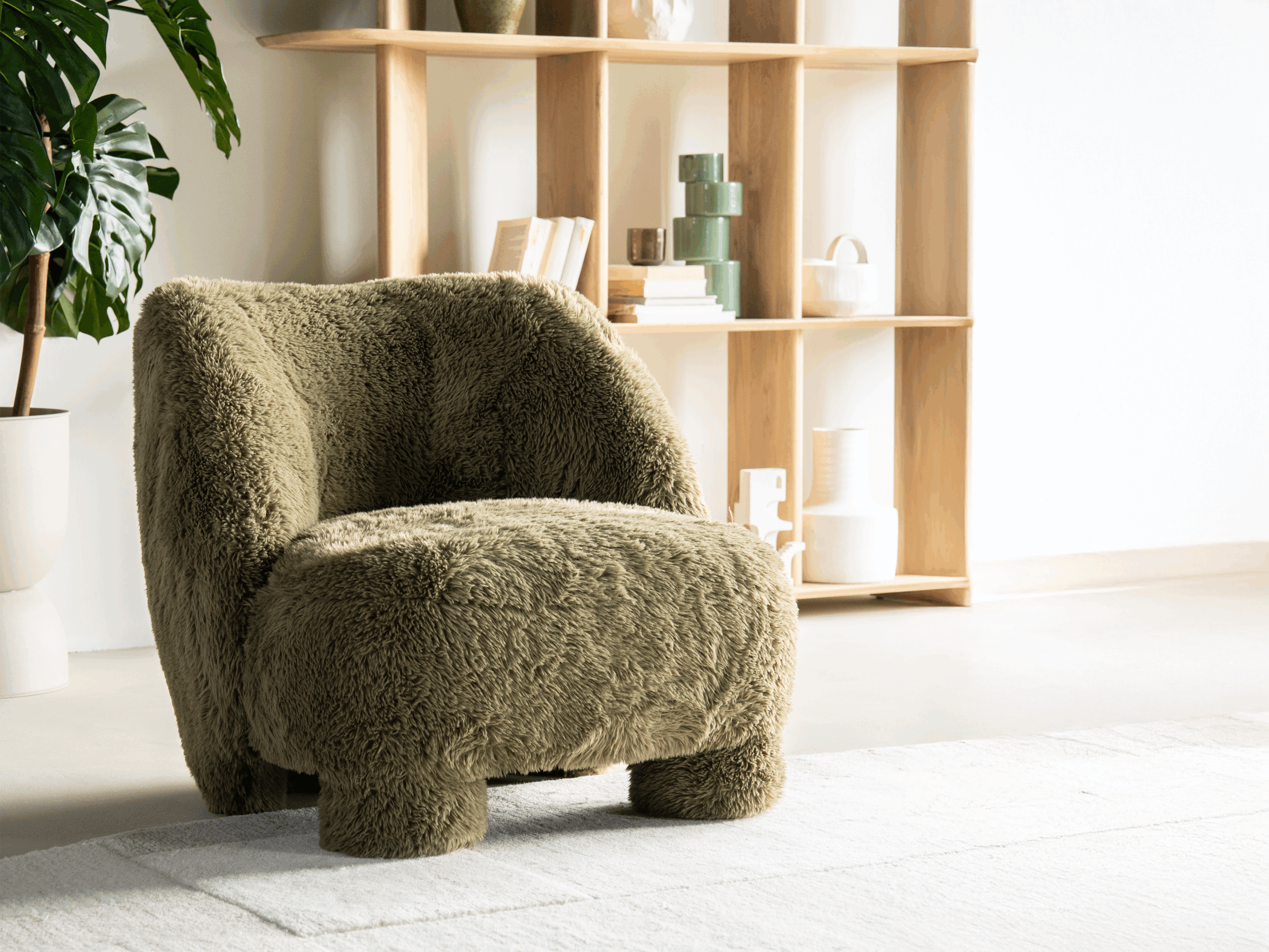 lage fauteuil met teddy stof en brede comfortabele zitting