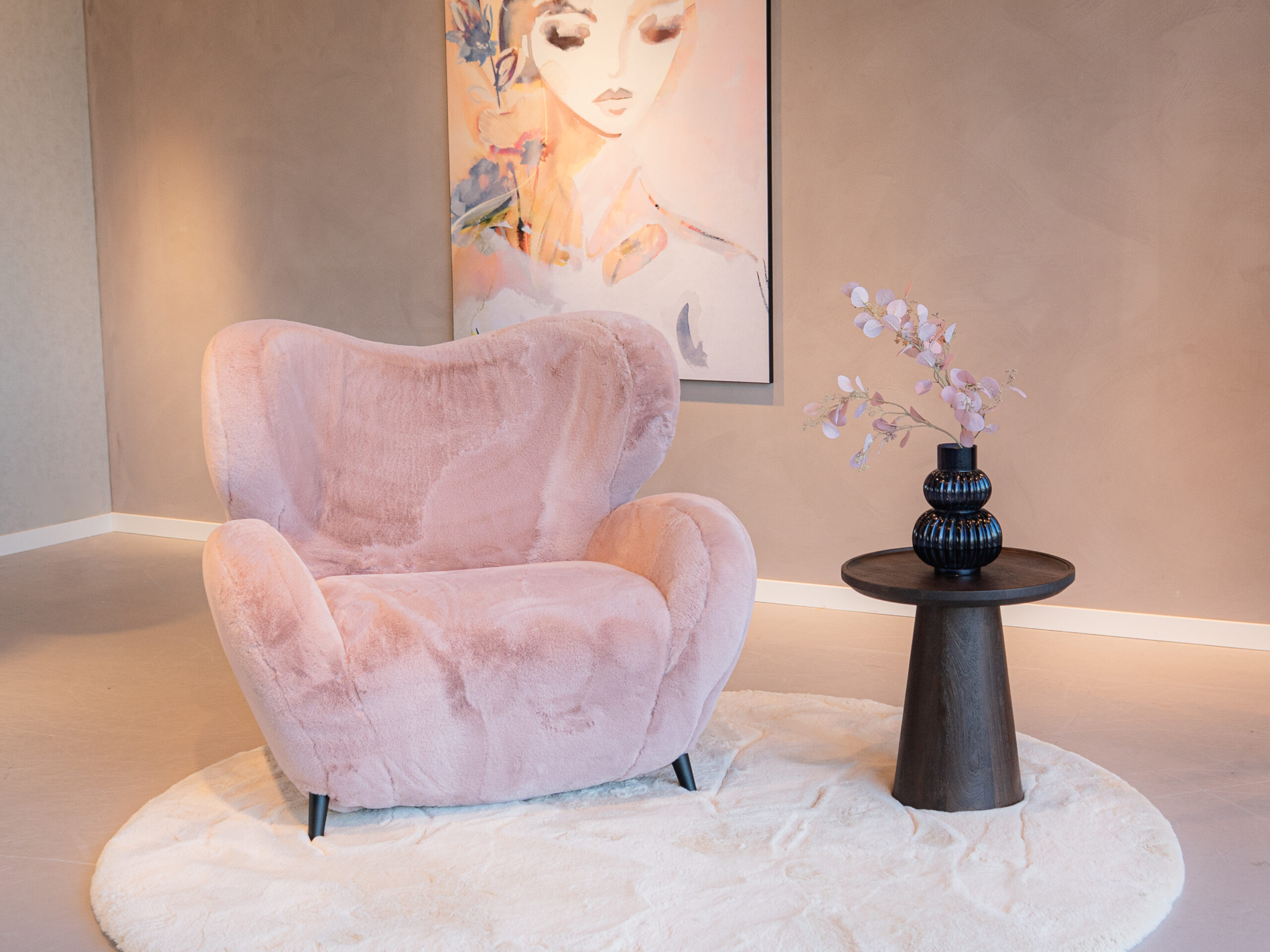 teddy fauteuil in een roze zachte stof