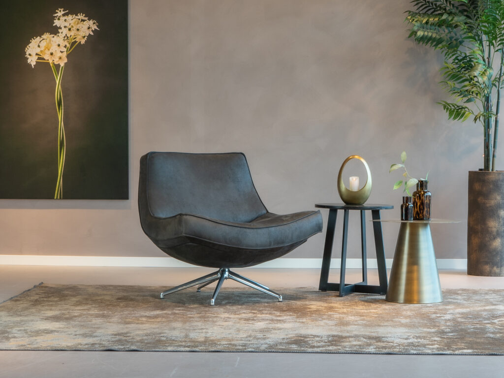 draaifauteuil in suede stof met rvs onderstel